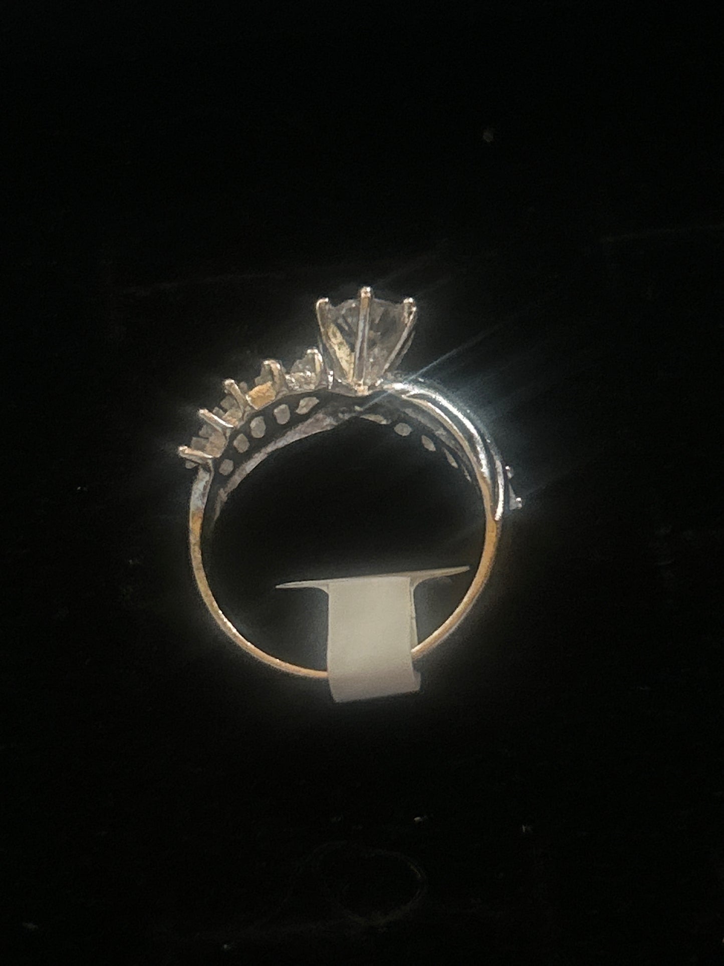 engagement ring featuring a cluster of cubic zirconia