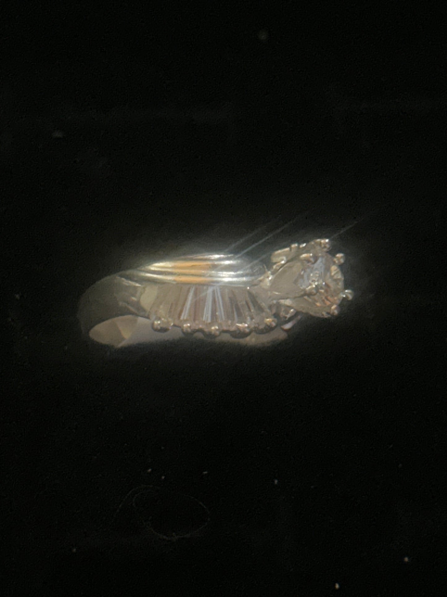 engagement ring featuring a cluster of cubic zirconia